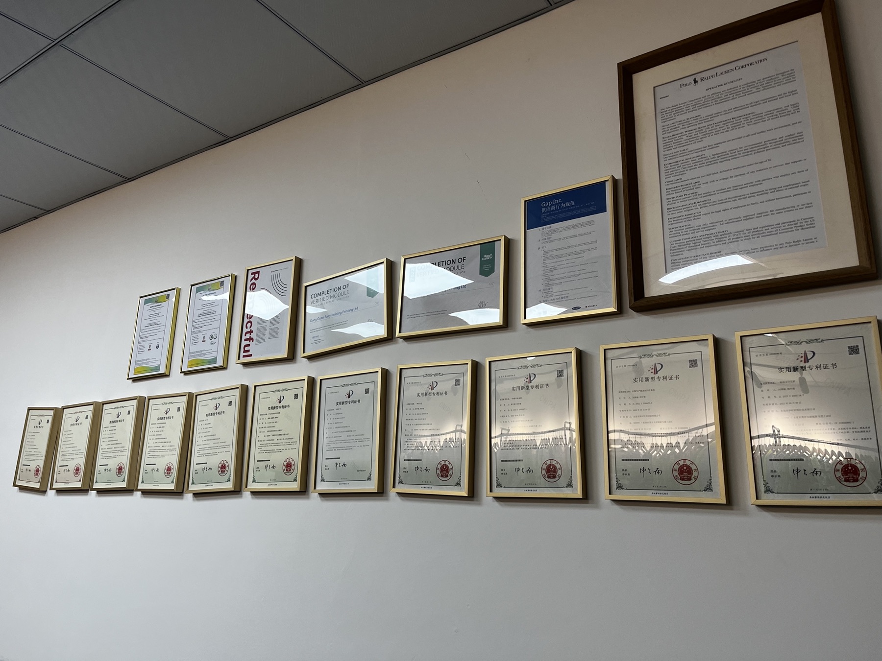 Wall of Topwell certifications and compliance certificates